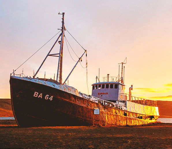 How to boost confidence. Shipwreck at the seashore with dreamy sundown. Blog article by RebeccaRoberts.com